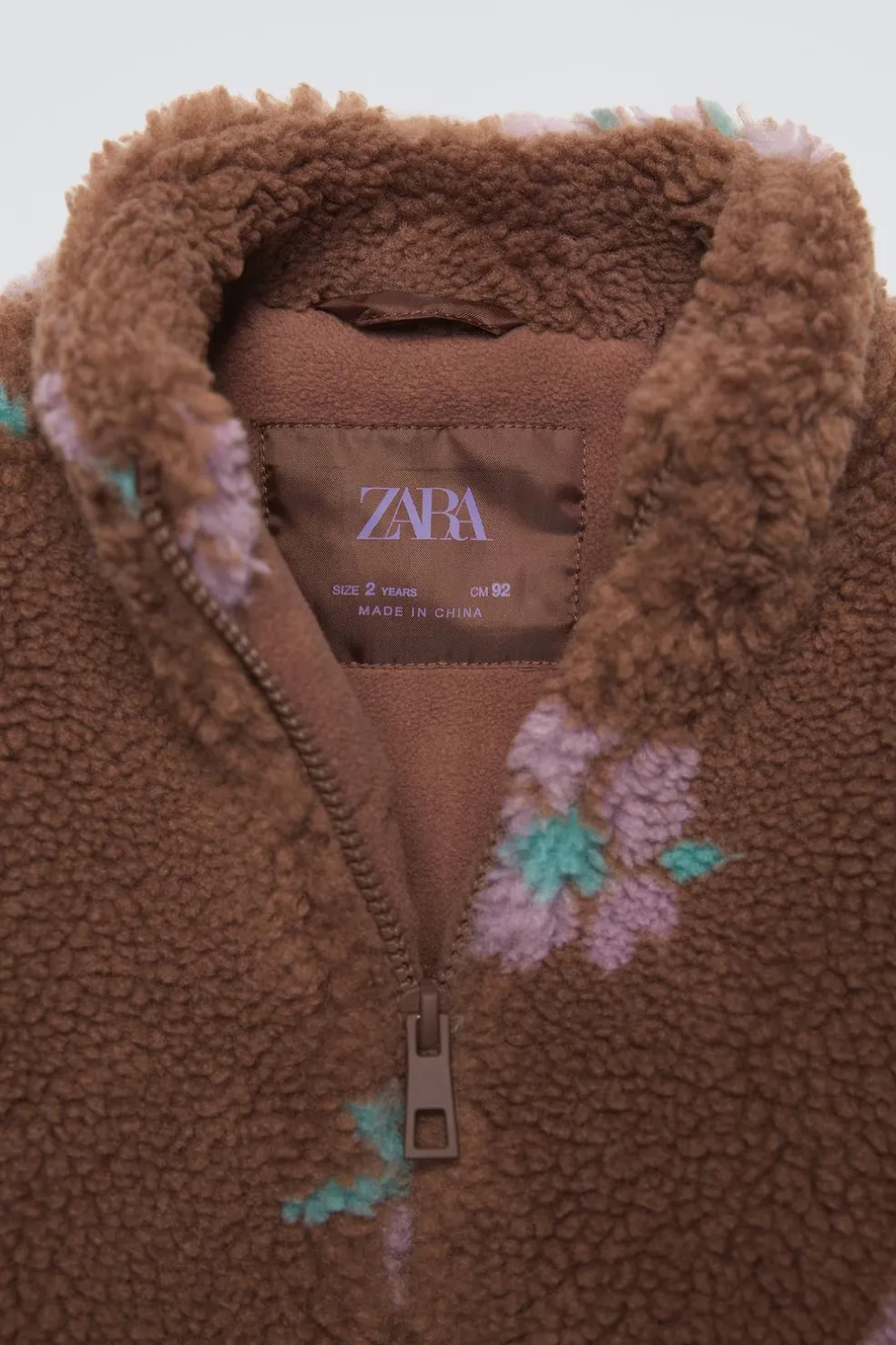 BLUSÃO COM EFEITO DE PELO ENCARACOLADO ESTAMPADO FLORES-ZARA Clearance