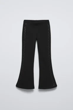 CALÇAS À BOCA DE SINO COM BOTÕES DE PRESSÃO-ZARA New