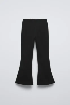 CALÇAS À BOCA DE SINO COM BOTÕES DE PRESSÃO-ZARA New