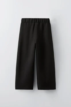 CALÇAS COM FAIXAS E BOTÕES DE MOLA-ZARA Clearance