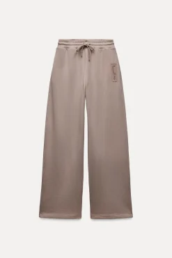 ZARA Calças|Sweatshirts / Joggers^CALÇAS DE FELPA COM ETIQUETA Avermelhado