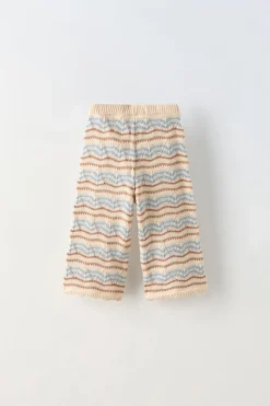 CALÇAS ÀS RISCAS COM BRILHO-ZARA New
