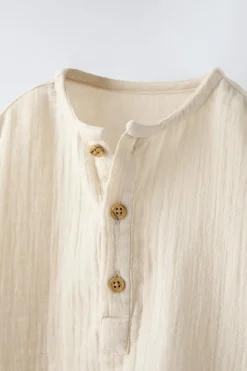 CAMISA COM DECOTE DE BOTÕES EM CREPE-ZARA Shop