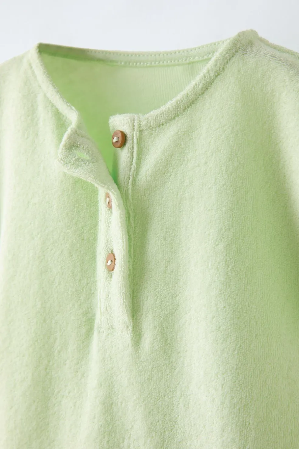 MACACÃO TERRYCLOTH COM DECOTE DE BOTÕES-ZARA Outlet