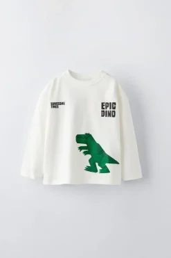 T-SHIRT ROSTOS DE DINOSSAURO-ZARA Fashion