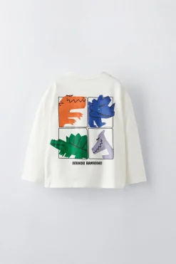 T-SHIRT ROSTOS DE DINOSSAURO-ZARA Fashion