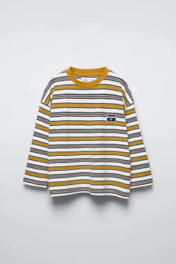 T-SHIRT ÀS RISCAS C/ REMENDO-ZARA Discount